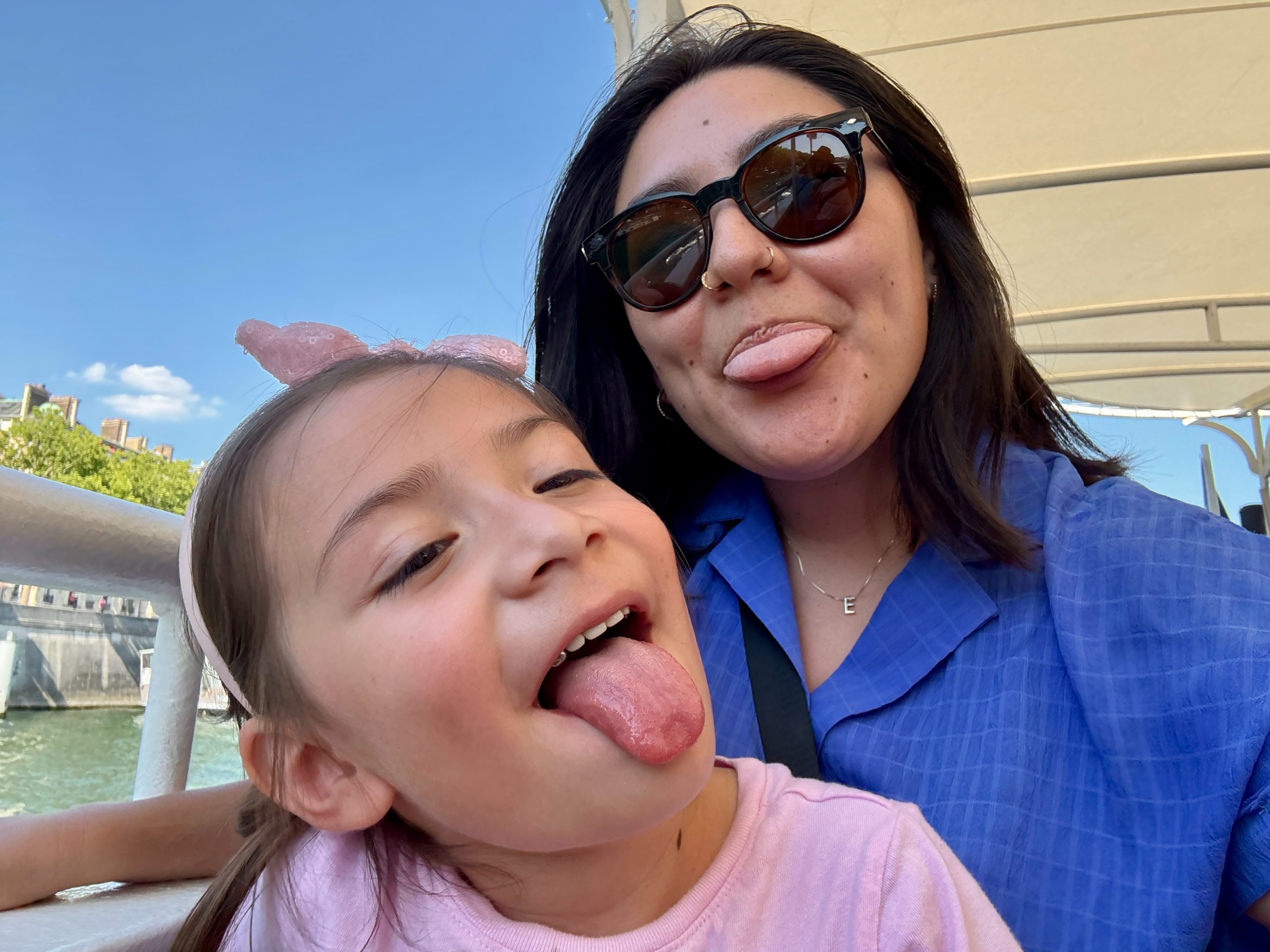 Mother and Daughter making silly faces at camera