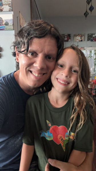 Philip Martin with child